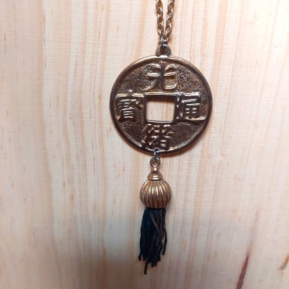 Vintage. Ben-Amun Asian Gold-tone Coin Pendant with Tassel